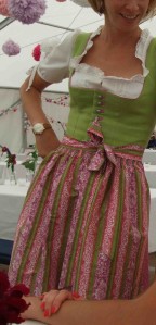 A wedding dirndl. An apron knotted at the front means the wearer is unmarried